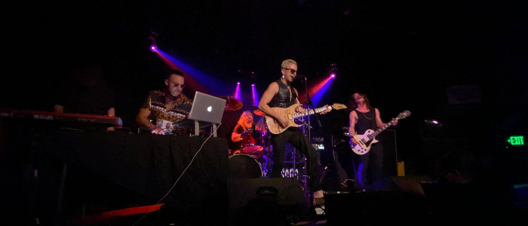 Güney performing live with his band